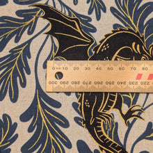 Load image into Gallery viewer, Close up flat lay of 30% Linen 70% Cotton Fireglow Dragon, ruler included for scale - for sale at Minerva's Bower