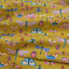 Load image into Gallery viewer, Flat drape of Thread and Ink 100% cotton, Flutter By, mustard cloth with all over butterfly dragonfly and insect print - available at Minerva's Bower