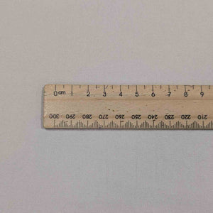 Close up of Flat lay of Fortney Heavyweight Organic 100%
Cotton in cloud for sale at Minerva's Bower, ruler included or scale 