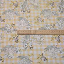 Load image into Gallery viewer, Flat lay of 100% Cotton, May Gibbs - Garden Playtime Yellow Gingham, ruler included for scale - for sale at Minerva's Bower