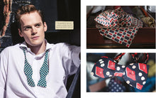 Load image into Gallery viewer, From the Gentleman&#39;s Wardrobe Book - a Man wearing a white shirt with green patterned bow tie, surrounded by various bow ties, available at Minerva&#39;s Bower