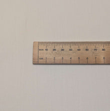 Load image into Gallery viewer, Close up flat lay of 96% cotton, 2% Lastol and 2% polyurethane (PU) Goose Denim, ruler included for scale - for sale at Minerva's Bower