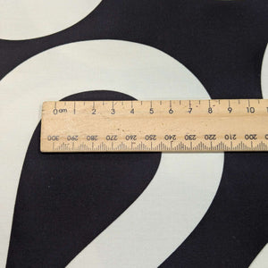 Close up of Groove, Mono 100% Cotton for sale at Minerva's Bower, ruler included for scale