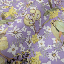Load image into Gallery viewer, Close up of 100% Cotton May Gibbs Gumnut Gossips in Lavender, ruler included for scale - for sale at Minerva's Bower