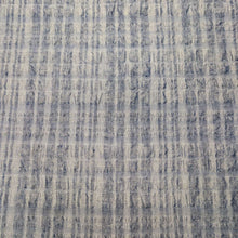 Load image into Gallery viewer, Flat lay of Yarn dyed 77% linen 23% cotton blend seersucker in Indigo - for sale at Minerva's Bower