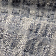 Load image into Gallery viewer, Close up of Yarn dyed 77% linen 23% cotton blend seersucker in Indigo - for sale at Minerva's Bower