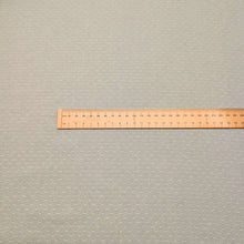 Load image into Gallery viewer, Flat lay of Japanese 100%Cotton Yarn Dyed Dobby, Sage, ruler included for scale- for sale at Minerva's Bower