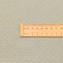 Load image into Gallery viewer, Close up flat lay of Japanese 100%Cotton Yarn Dyed Dobby, Sage, ruler included for scale- for sale at Minerva's Bower