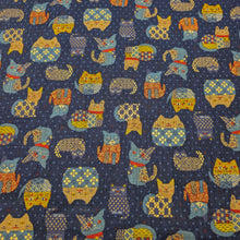Load image into Gallery viewer, Pattern of colorful cats on a blue cotton dobby background. Made in Japan. Available at Minerva's Bower