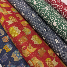 Load image into Gallery viewer, Red cotton fabric with white cat pattern. Made in Japan. Available at Minerva's Bower. A collection of similar fabrics is shown