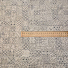 Load image into Gallery viewer, Patterned fabric with geometric sashiko design on a cream cotton background. Made in Japan. Available at Minerva's Bower. Ruler included for scale