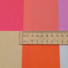 Load image into Gallery viewer, Checkered cotton fabric with pink, orange, and yellow squares. Made in Japan. Available at Minerva's Bower. Ruler included for scale
