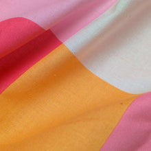 Load image into Gallery viewer, Checkered cotton fabric with pink, orange, and yellow squares. Made in Japan. Available at Minerva's Bower. Fabric draped to show how it handles