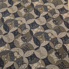 Load image into Gallery viewer, Patterned cotton fabric with circular shapes in shades of grey, brown, and blue. Made in Japan. Available at Minerva's Bower