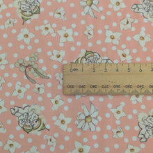 Load image into Gallery viewer, Close up of flat lay of 95% bamboo and 5% elastane jersey with may gibbs gumnut baby design, ruler included for scale, for sale at Minerva's Bower