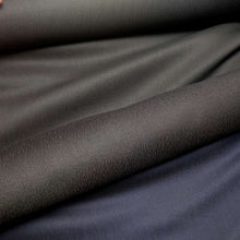Load image into Gallery viewer, Jog Denim in Black and Indigo and showing reverse face, for sale at Minerva's Bower