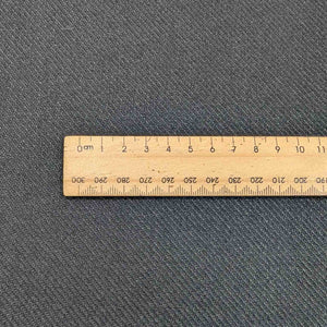 Flat Lay of Kanebo Black heavyweight 100% Wool twill for sale at Minerva's Bower, ruler included for scale