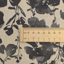 Load image into Gallery viewer, Close up flat lay of Kokka Suisai Hana, Charcoal 15% linen 85% cotton Japanese cloth in natural linen colour with charcoal watercolour flowers, ruler included for scale  - for sale at MInerva's Bower