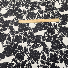 Load image into Gallery viewer, Black floral pattern cotton twill fabric with a white background, for sale at Minerva&#39;s Bower, ruler included for scale