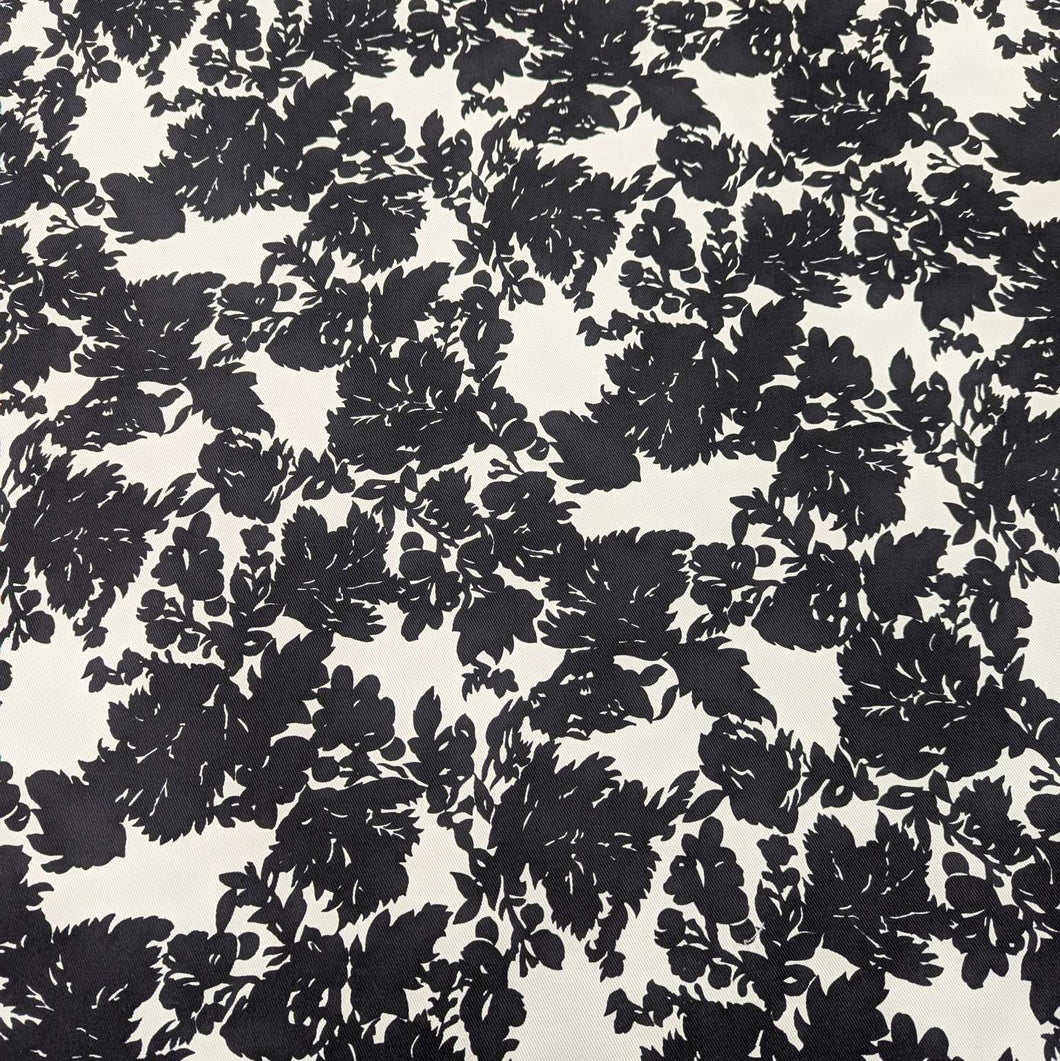 Black floral pattern cotton twill fabric with a white background, for sale at Minerva's Bower