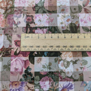 Floral Liberty of London fabric swatches with a ruler for scale. Available at Minerva's Bower