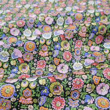 Load image into Gallery viewer, Liberty Cotton Tana Lawn, Begonia C flat lay, for sale at Minerva&#39;s Bower. Part of 150th Anniversary Collection. Fabric draped to show how it handles