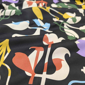 Colorful floral pattern on black Liberty of London fabric. Available at Minerva's Bower