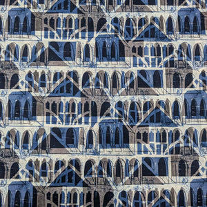 Liberty of London patterned fabric with architectural design in blue, brown, and beige. Available at Minerva's Bower