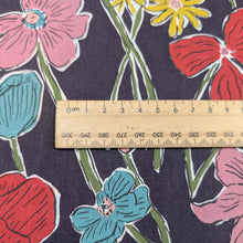 Load image into Gallery viewer, Floral Liberty of London fabric pattern with a ruler for scale on a dark background. Available at Minerva&#39;s Bower