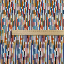 Load image into Gallery viewer, Colorful geometric patterned Liberty of London fabric with a ruler for scale. Available at Minerva&#39;s Bower