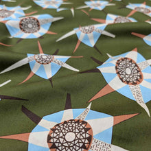 Load image into Gallery viewer, Liberty of London patterned fabric with geometric shapes on a green background. Available at Minerva&#39;s Bower