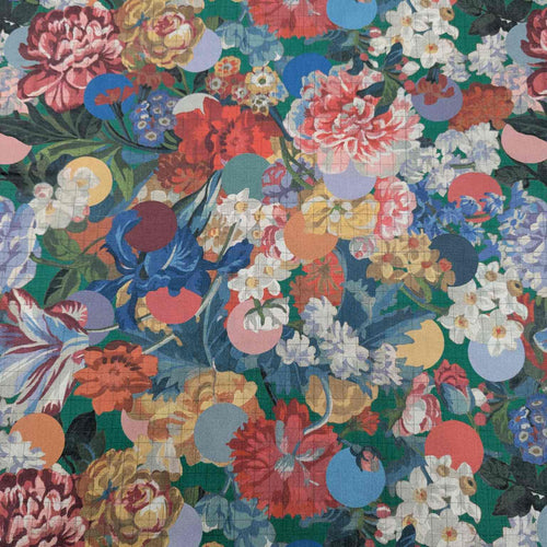 Colorful floral pattern with various flowers on a dark green background. Liberty of London fabric, available at Minerva's Bower