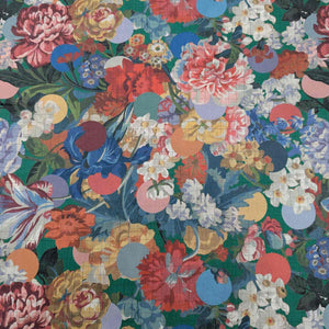 Colorful floral pattern with various flowers on a dark green background. Liberty of London fabric, available at Minerva's Bower