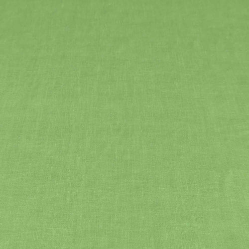 A flat lay of Feijoa pure antique wash linen. Available at Minerva's Bower 