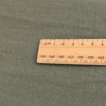 Load image into Gallery viewer, Close up flat lay of 200gsm 100% Linen Antique Wash, Khaki - for sale at Minerva's Bower
