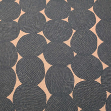 Load image into Gallery viewer, Pattern of dark grey circles on a beige cotton/linen fabric background. Made in Japan. Available at Minerva's Bower