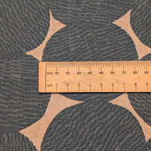 Load image into Gallery viewer, Pattern of dark grey circles on a beige cotton/linen fabric background. Made in Japan. Available at Minerva's Bower. Ruler included for scale