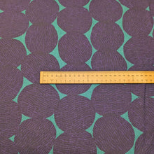 Load image into Gallery viewer, Pattern of purple circles on a teal cotton /linen fabric background. Made in Japan. Available at Minerva's Bower. Ruler included for scale
