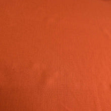 Load image into Gallery viewer, Flat lay of 100% heavyweight linen in rusty orange for sale at Minerva&#39;s Bower