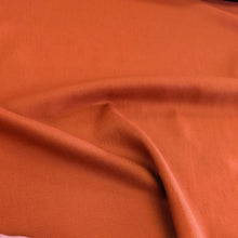 Load image into Gallery viewer, Drape of 100% heavyweight linen in rusty orange for sale at Minerva&#39;s Bower