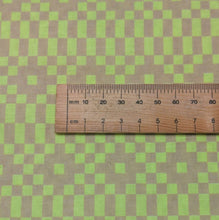 Load image into Gallery viewer, Close up flat lay of Ruby Star, Lofi Linen 85% cotton 15% linen Bitmapped Neon Yellow, ruler included for scale - for sale at Minerva's Bower