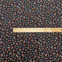 Load image into Gallery viewer, Flat lay of Lucille 100% Cotton Pinwale Cord in Black by Kokka, ruler included for scale- for sale at Minerva's Bower 