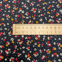 Load image into Gallery viewer, Close up Flat lay of Lucille 100% Cotton Pinwale Cord in Black by Kokka, ruler included for scale - for sale at Minerva's Bower 