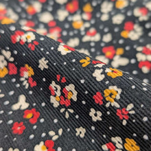 Load image into Gallery viewer, Close up drape of Lucille 100% Cotton Pinwale Cord in Black by Kokka - for sale at Minerva's Bower 