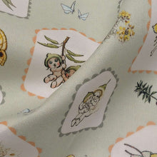 Load image into Gallery viewer, Close up of 100% Cotton, May Gibbs, Garden Playtime in Sage, ruler included for scale - for sale at Minerva's Bower