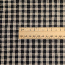 Load image into Gallery viewer, Close up flat lay of Melange 100% Linen, Black Oatmeal Gingham Check, for sale at MInerva's Bower, ruler included for scale