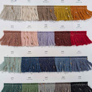 Color swatches of Merino Fleck yarn with corresponding numbers on a white background