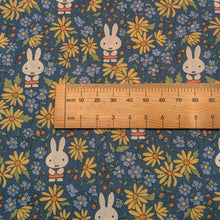 Load image into Gallery viewer, Close up flat lay of Liberty 100% Cotton Tana Lawn, Miffy Prairie Day F, ruler included for scale - for sale at MInerva's Bower