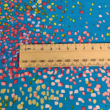 Load image into Gallery viewer, Close up flat lay of Iconic Nani IRO Water Fall , 80% Cotton 20% Silk, for sale at Minerva's Bower - ruler included for scale