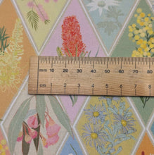 Load image into Gallery viewer, Close up flat lay of 100% Cotton by Devonstone, Aussie Backyard Native Flora, ruler included for scale - for sale at Minerva's Bower